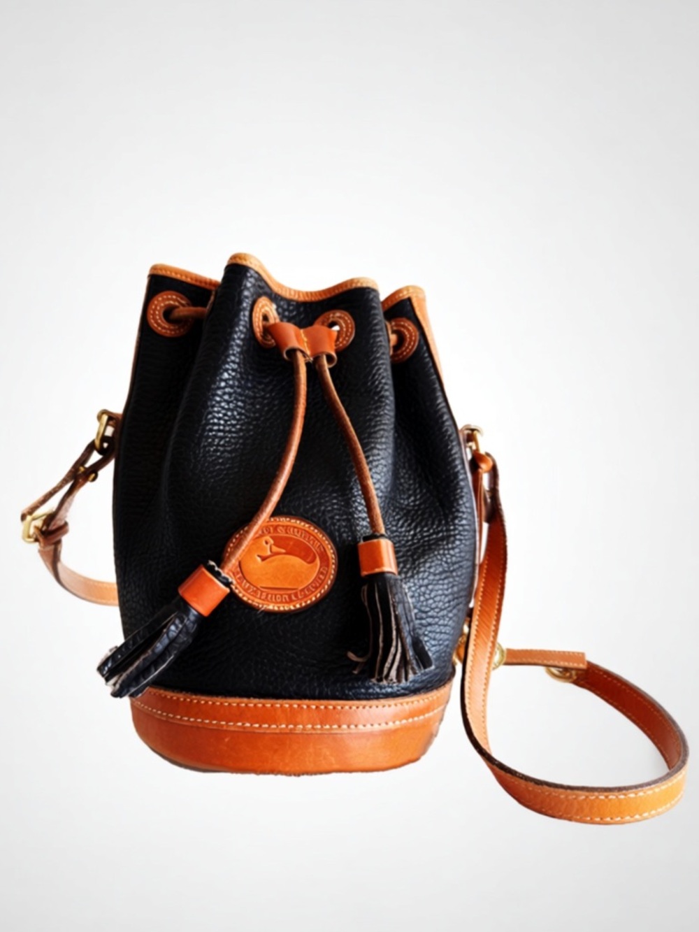 Dooney & Bourke Black Pebbled Leather Crossbody with Brown Logo Patch